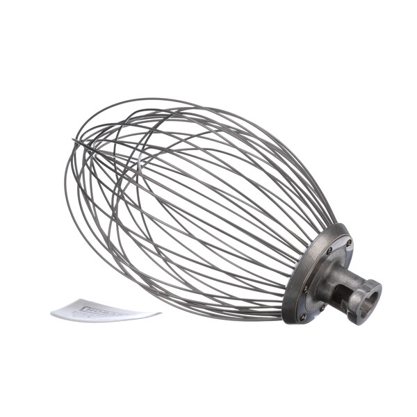 A Hobart wire whisk with a metal handle and metal blade.