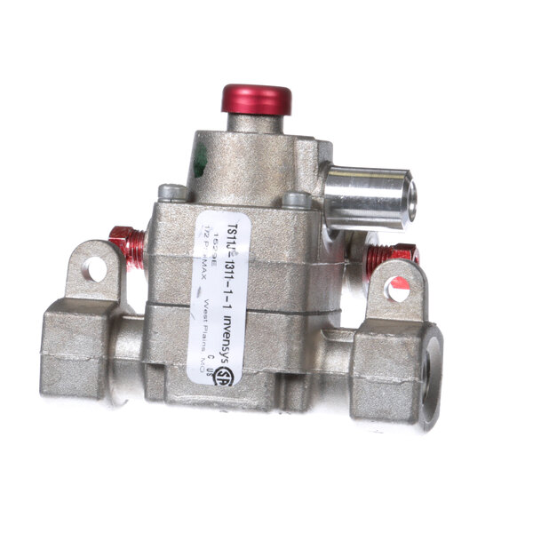 A close-up of a silver and red Royal Range oven pilot safety valve.