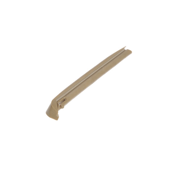 A beige plastic lower blade for a coffee machine.