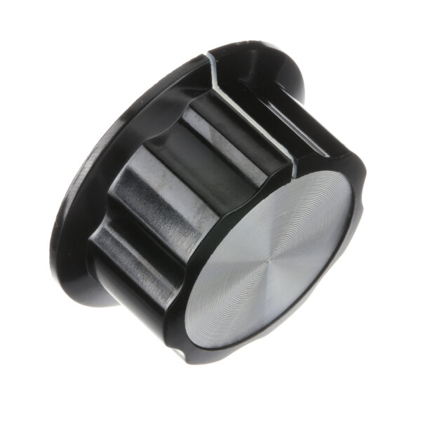 A black and silver Winholt heat control knob.