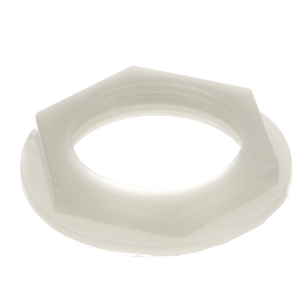 A white plastic nut with a hole.