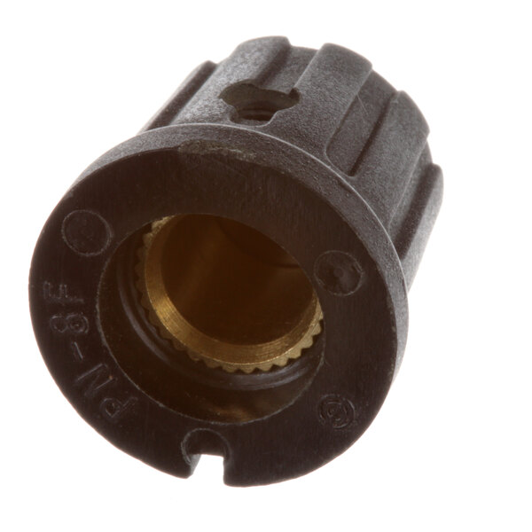 A black plastic Wisco Industries T-Stat knob with a gold center.