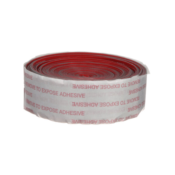 A roll of red and white tape with the words "extra - wide" in white