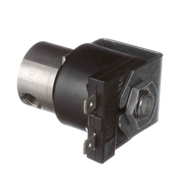 A close-up of a small black Newco solenoid valve with silver accents.