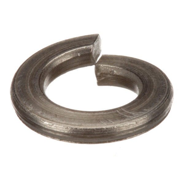 A close-up of a broken metal ring with a hole in it.