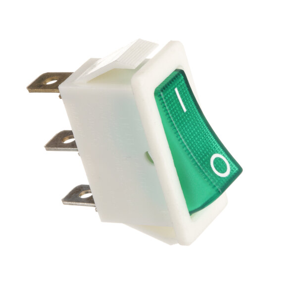 A close-up of a green Carpigiani push button switch with a white cover.