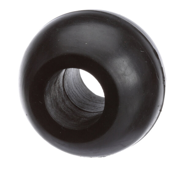 A black rubber drain ball with a hole in it.