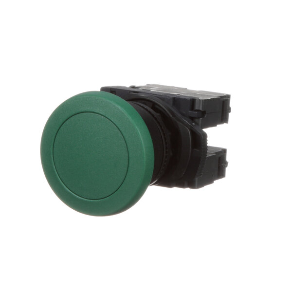 A close-up of a green and black Hardt 4563 round push button switch.