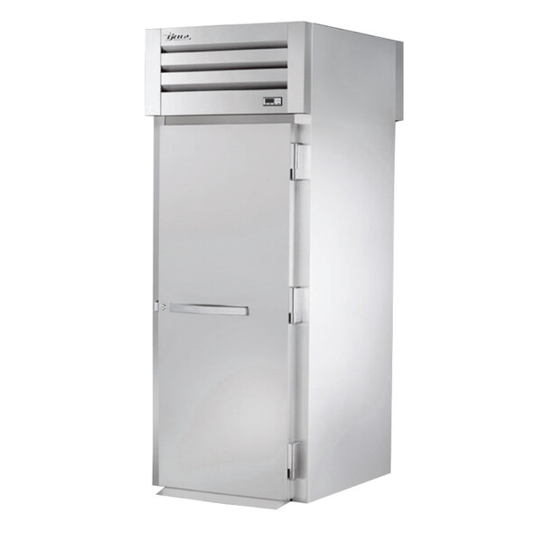 A white True roll-through heated holding cabinet with a stainless steel door and silver handle.