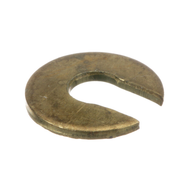 A brass Oliver washer with a hole in it.