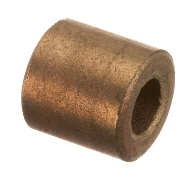 A close-up of a bronze bushing with a hole in a metal cylinder.