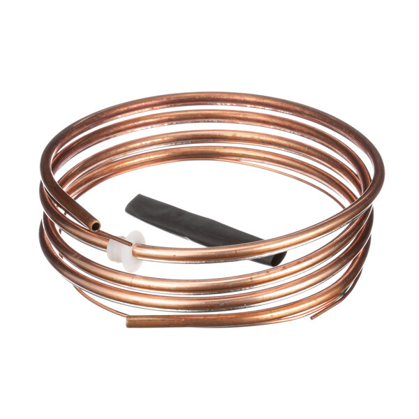 A close-up of a copper tube with a black wire.