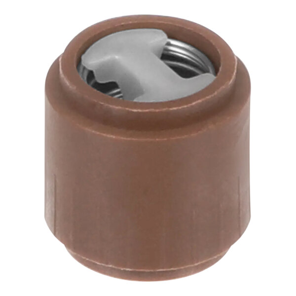 A brown plastic object with a metal screw.