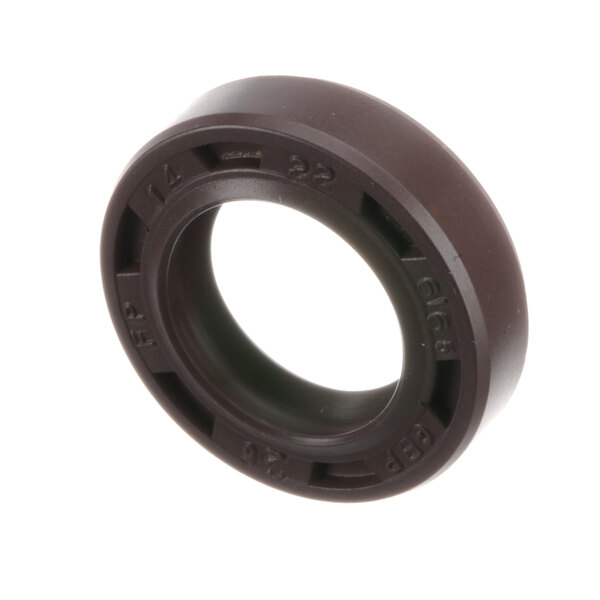A brown rubber seal with a black ring on a Stoelting by Vollrath ice cream freezer.