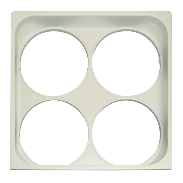 A white square plastic cover with four circle holes in it.
