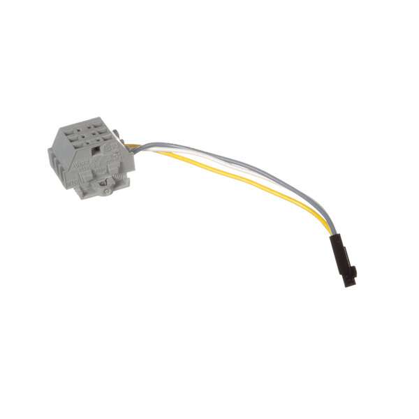 A grey Schaerer electrical connector with yellow wires.