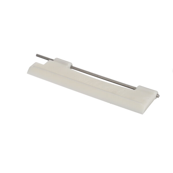 A white plastic object with a metal bar.