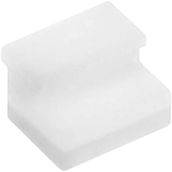 A white plastic square door spacer.