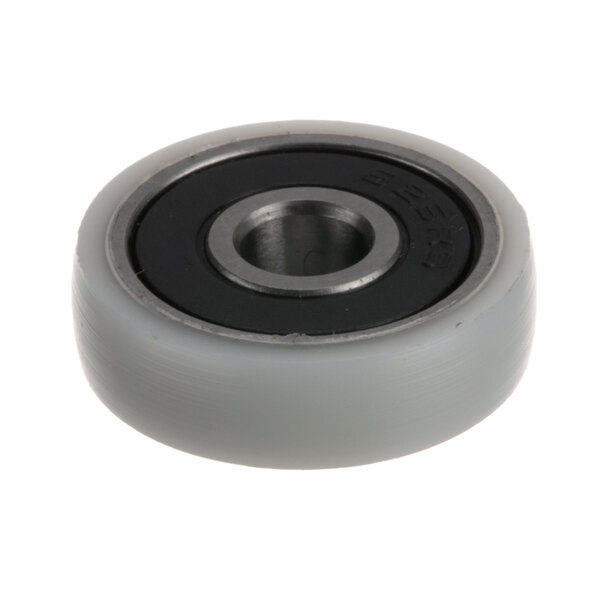 A grey nylon Vollrath roller wheel with a round black center.