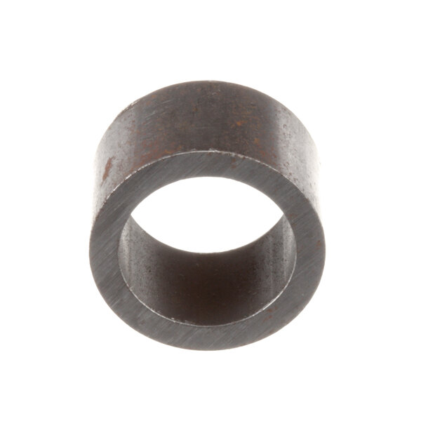 A close-up of a Blodgett 912 metal bushing with a hole in it.