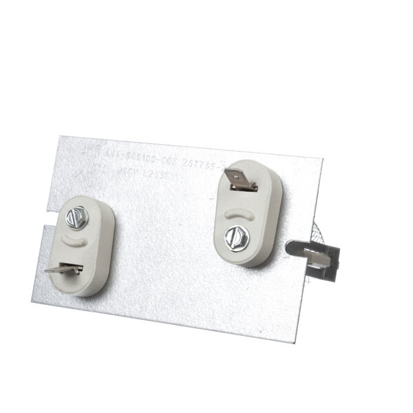 Two white metal plates with a white electrical device and screws.