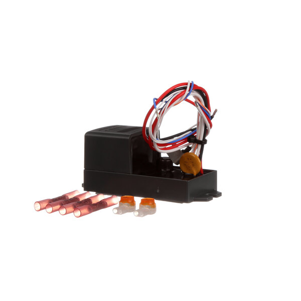 A black Wilbur Curtis temperature control device with red and white wires.