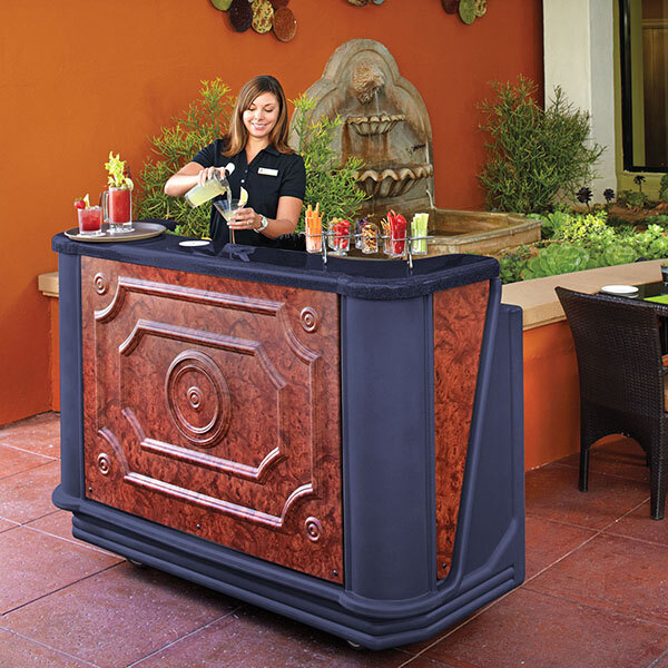 A woman pouring a drink at a Carmel portable bar.