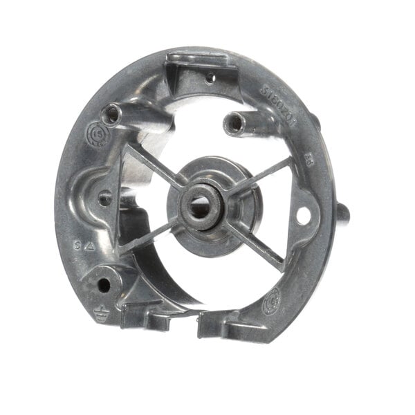 A metal bracket bearing with a circular hole.