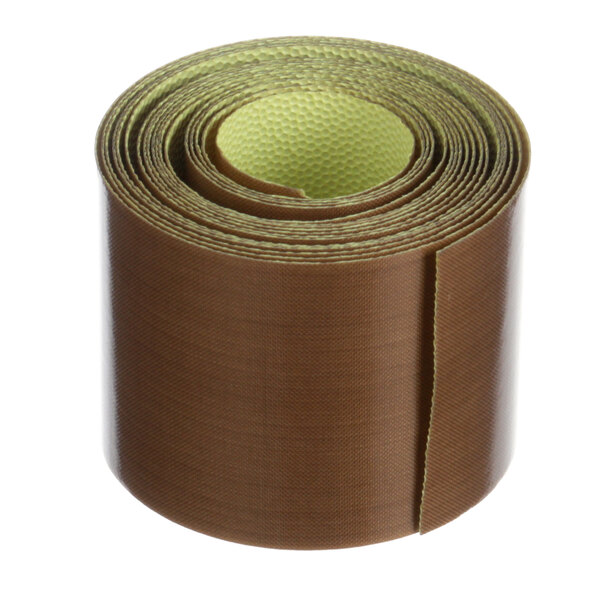 A roll of brown tape with green edges.