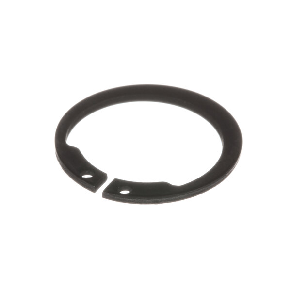 A close-up of a black rubber ring with a hole in it.