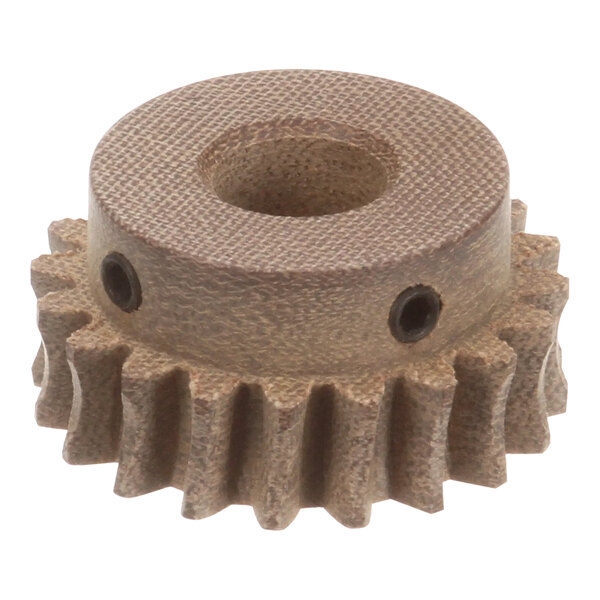 A close-up of a brown Hickory fiber gear with holes.