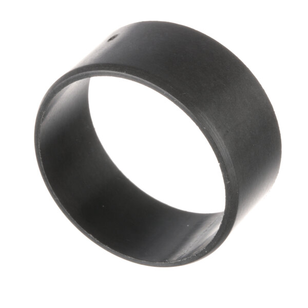A black rubber bushing with a hole in it.