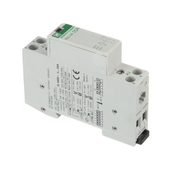 A white electronic relay with a green and white label.