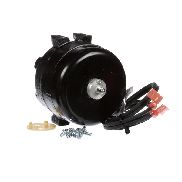 A black round Frigoglass condenser fan motor with wires and screws.