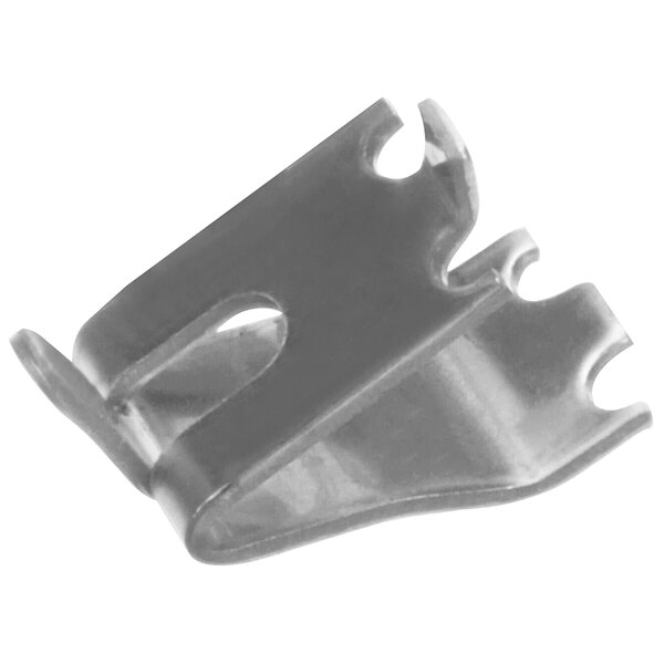 A close up of a silver metal Tor Rey shelf clip.