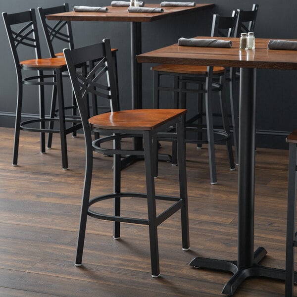 Lancaster Table & Seating Black Finish Cross Back Bar Stool with Antique Walnut Wood Seat - Assembled