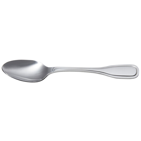 An Arcoroc stainless steel teaspoon with a silver handle and spoon.