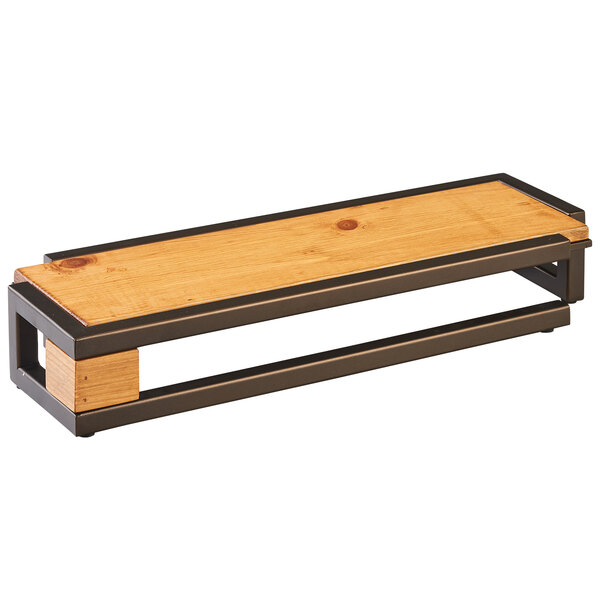 A wood and metal rectangle riser with a rustic pine design.