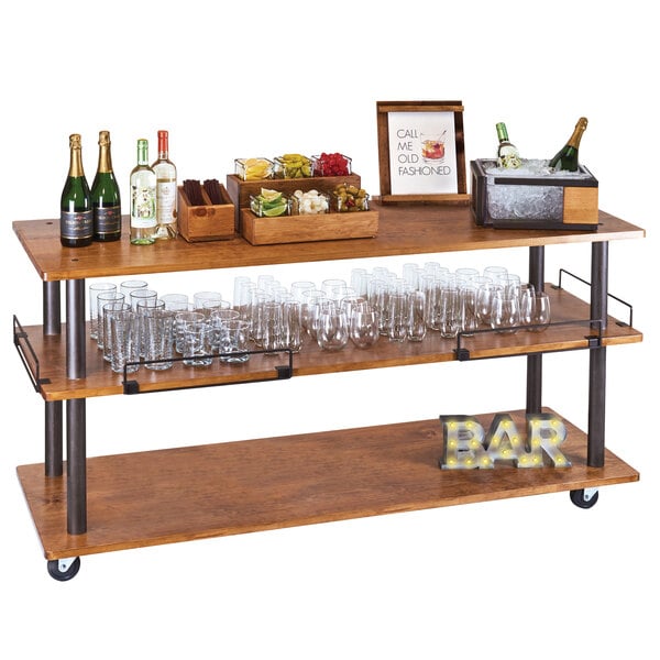 A Cal-Mil Sierra U-Build cart with wine glasses and glasses on a shelf.