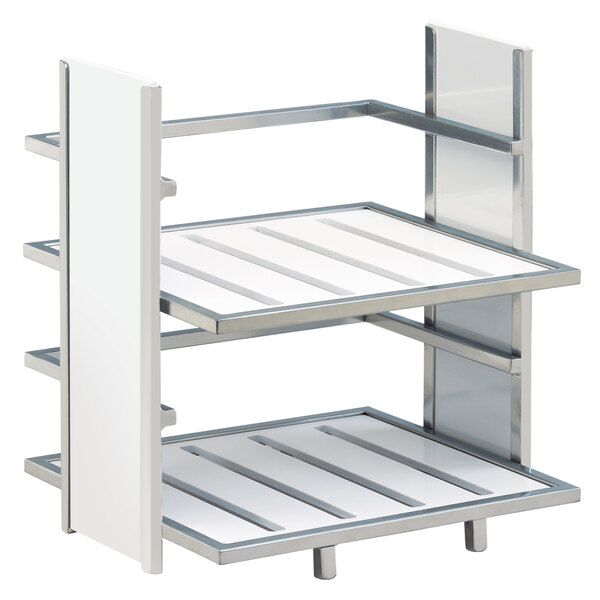 A white Cal-Mil two tier merchandiser with silver accents.