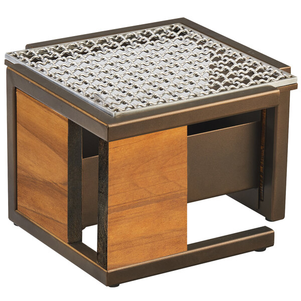 A Cal-Mil Sierra bronze metal and rustic pine chafer alternative on a table with a metal top.