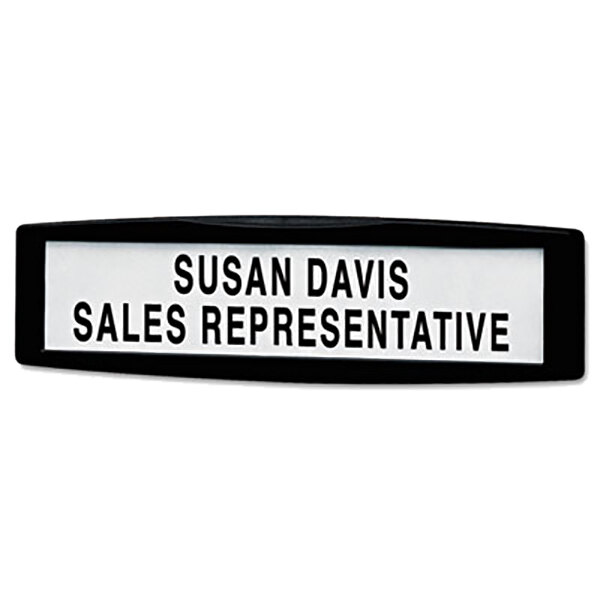 A black and white plastic nameplate with black text on white background.