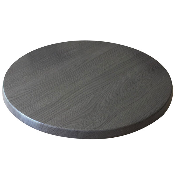 A Holland Bar Stool EnduroTop round table top in charcoal.