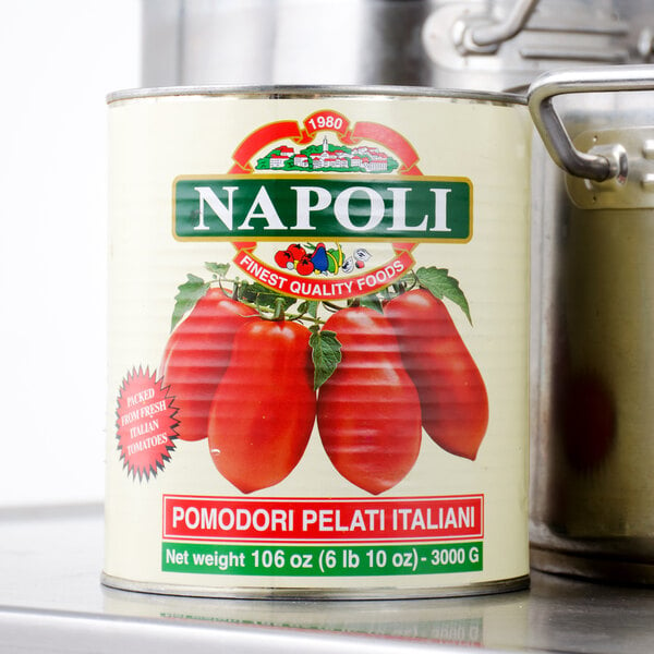 A case of Napoli Foods #10 canned whole peeled Italian tomatoes on a counter.
