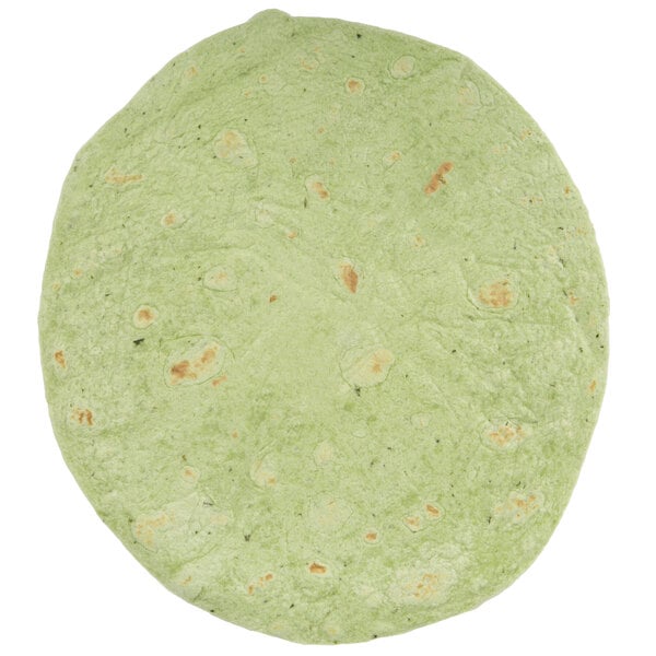 A close-up of a green Mission spinach herb tortilla.