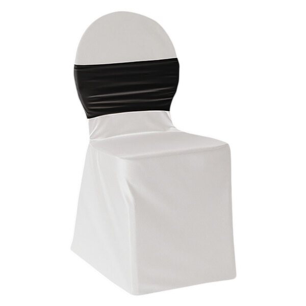 A white chair with a black chair cover with a black band.