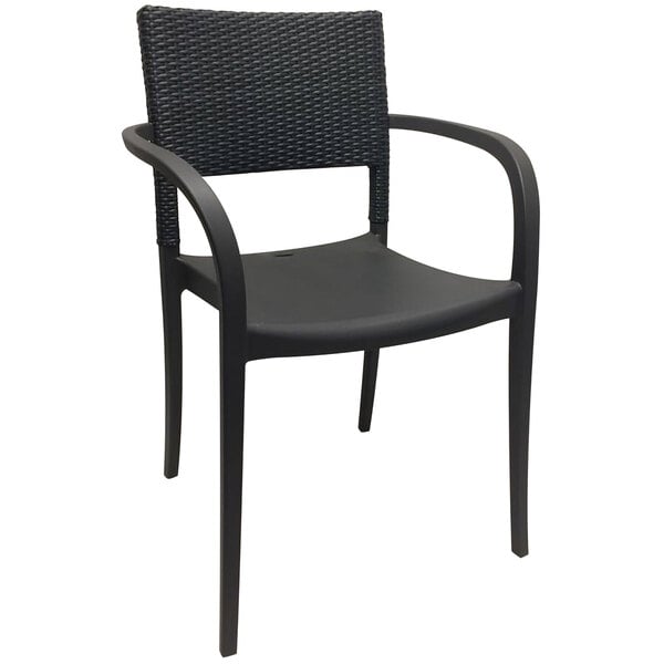 A Grosfillex Java charcoal resin armchair with wicker back and black frame.