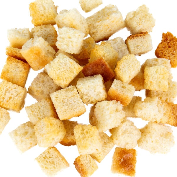 A pile of Fresh Gourmet Plain Cube Croutons on a white background.