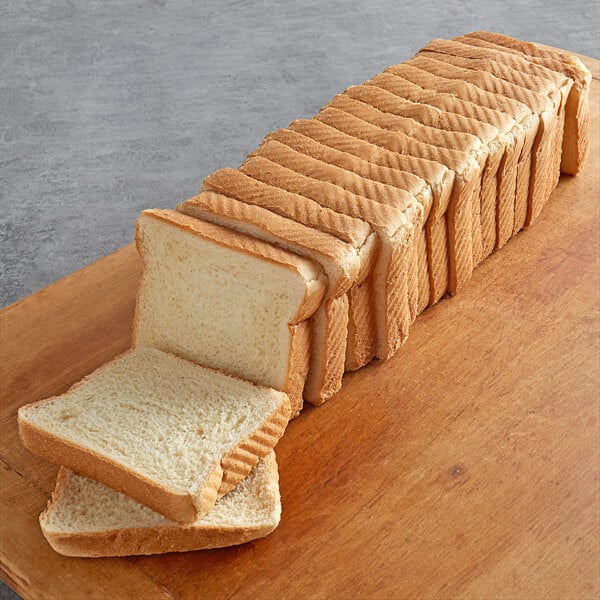 Sliced Burry Texas Toast on a wooden surface.