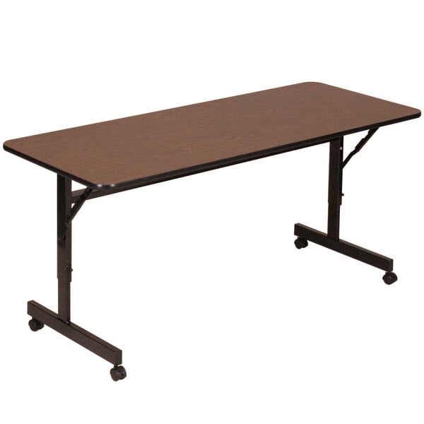 A walnut Correll EconoLine rectangular table with wheels.